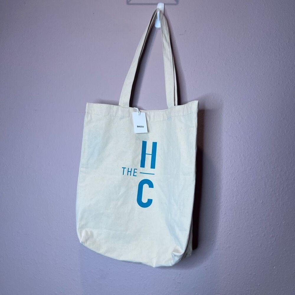 promotional bag natural cotton canvas featuring a graphic that says "THE HC" tot